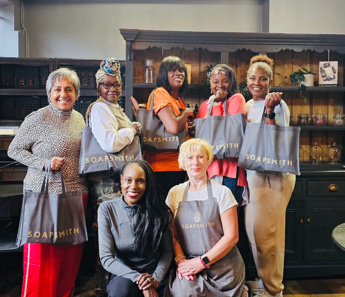 Workshop guests gathered at Soapsmith with their tote bags