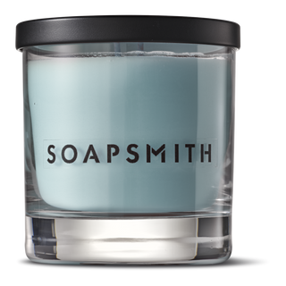 King's Road soy candle with the black lid on